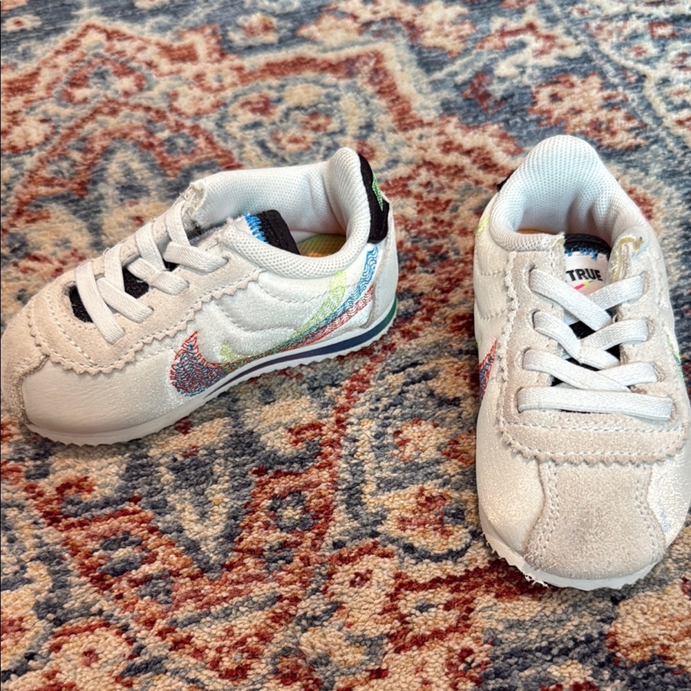 Nike White Sneakers with Padded Collar and Sporty Design